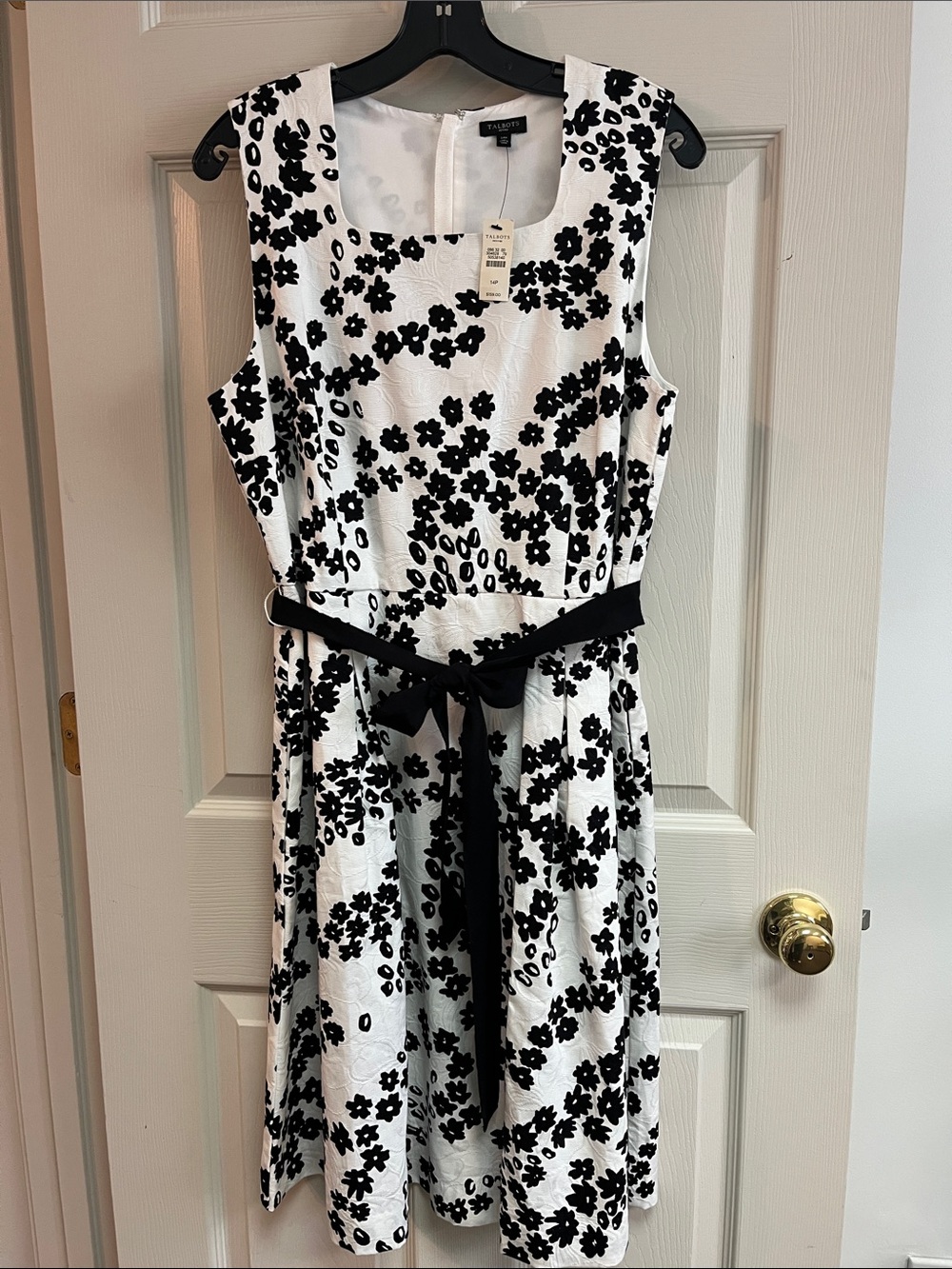Talbots floral textured dress. Back zip. Removable ribbon tie.Lined.NWT.Size 14P